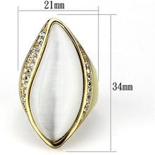 Cargar imagen en el visor de la galería, Anillo de latón dorado (chapado de iones) con ojo de gato sintético
